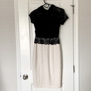 New York and Company Black and Cream dress with sheer lace top and slit